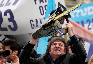 Javier Milei wields a chainsaw Javier Milei wields a chainsaw