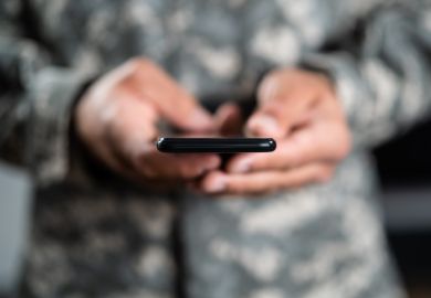 Military Soldier Smart Phone Espionage. Cyber War