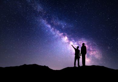 Two people staring into the night sky Two people staring into the night sky