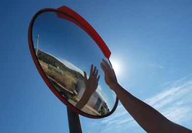 Hand reflecting in a mirror Hand reflecting in a mirror