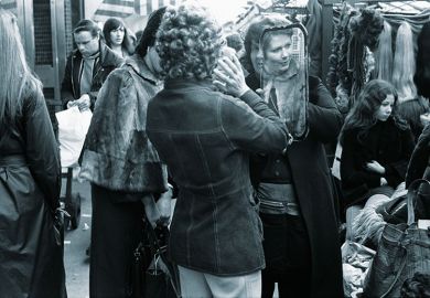 Woman looking in mirror