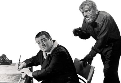 Monster behind man at desk