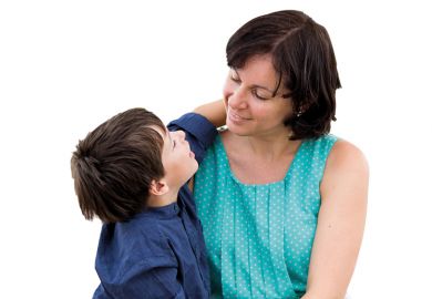 Mother speaking to young son Mother speaking to young son