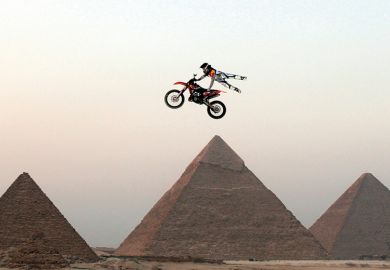 Motorbike jumping the pyramids