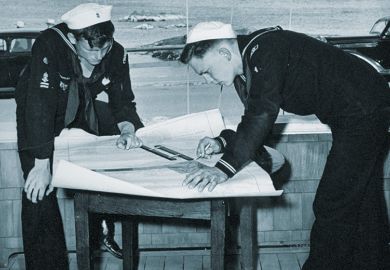 Naval officers with chart