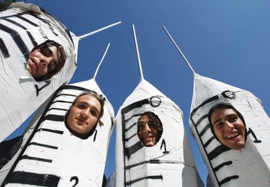People dressed in syringe costumes