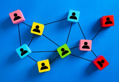 A network of wooden blocks with people icons on them