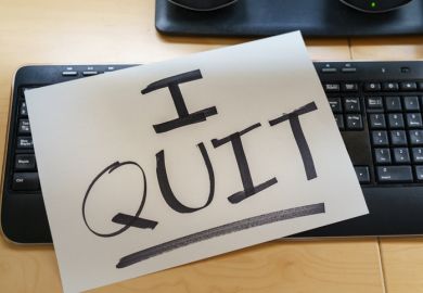 Note on a keyboard with the text I QUIT