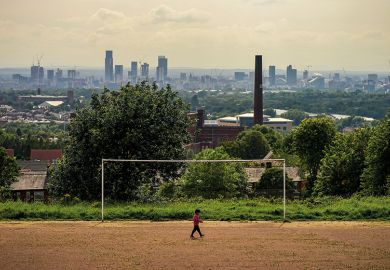 A general view of an old cotton mill in Oldham with the city of Manchester on the horizon, 2020 A general view of an old cotton mill in Oldham with the city of Manchester on the horizon, 2020