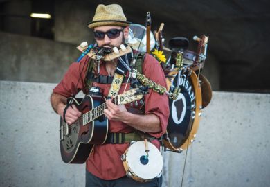 One-man band playing instruments, Lancaster, Pennsylvania