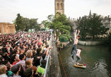 Men jumping into the river