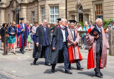 Oxford, England - June 19, 2013 Official proctors and Academics process along Catte street to All Souls College of Oxford University at graduation day