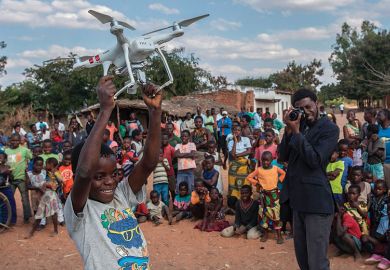 Boy holding drone Boy holding drone