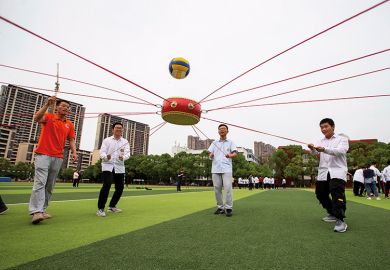 Students play stress relief games in Hai’an City, Jiangsu Province, China
