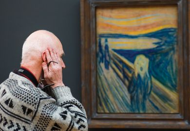 A visitor looks at ‘The Scream’ by Edvard Munch at the Tretyakov Gallery, illustrating a review of ‘Why We Are Restless: On the Modern Quest for Contentment’ by Benjamin Storey and Jenna Silber Storey