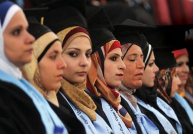 Palestinian students at Al-Quds Open University graduation ceremony