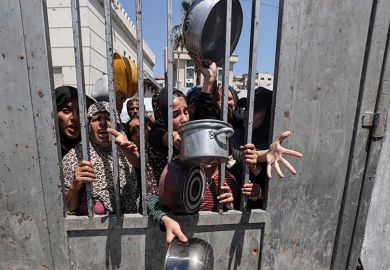 Displaced Palestinians including women and children wait to receive food distributed by aid organisations in Gaza City, Gaza on 29 May 2025. The situation highlights the growing desperation and urgent need for humanitarian assistance. Displaced Palestinians including women and children wait to receive food distributed by aid organisations in Gaza City, Gaza on 29 May 2025. The situation highlights the growing desperation and urgent need for humanitarian assistance.