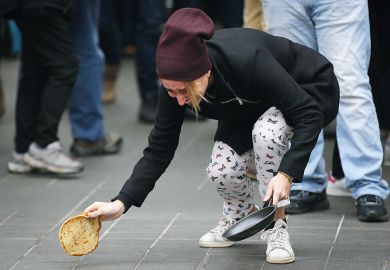 woman drops pancake