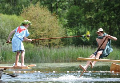 Participants fight during Fischerstechen fishermen joust competition