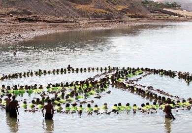 people make the shape of a peace sign in the water people make the shape of a peace sign in the water