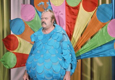 Man in peacock costume