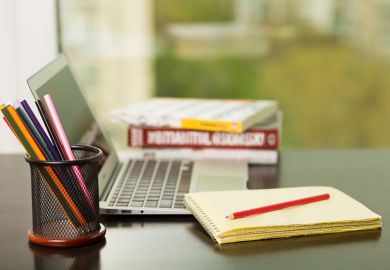 Laptop, books and pencils Laptop, books and pencils