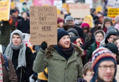A protester holding a placard