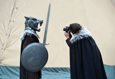 people dressed in game of thrones costume