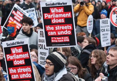 People holding signs at a protest