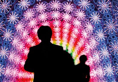 People in a light tunnel