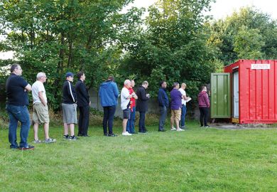 People queuing for toilet