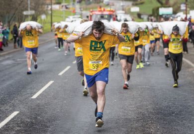 People running in World Coal Carrying Championships, Yorkshire