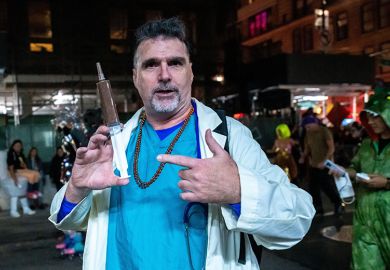 Person wearing a doctor's costume at the Halloween Parade in New York. To illustrate students obtaining fake doctor's notes.