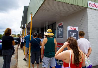 Perth, Australia - March 15, 2020 People queuing at Coles grocery store during the Coronavirus crisis