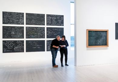 Chalkboards with equations by contemporary physicists