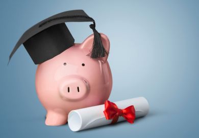 Piggy bank wearing mortar board (tuition fees)