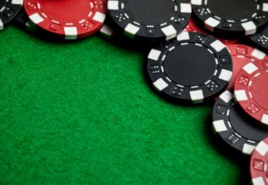 Pile of casino chips on gambling table Pile of casino chips on gambling table