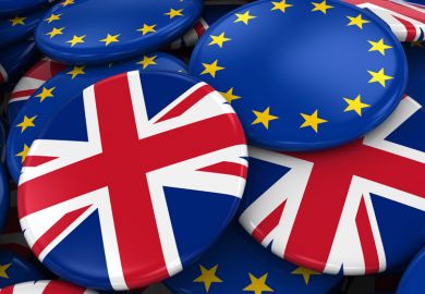 Pile of European Union (EU) and United Kingdom (UK) flag badges