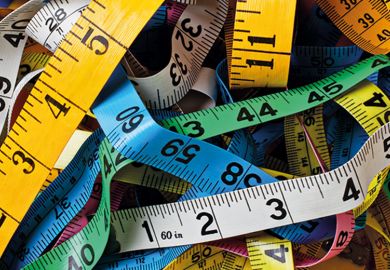 Pile of colorful measuring tapes Pile of colorful measuring tapes