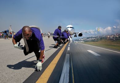 people pull plane along runway