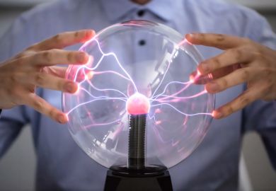 Hands on a plasma globe