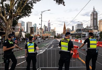 Members of Victoria Police patrol St. Kilda Road, Melbourne Members of Victoria Police patrol St. Kilda Road, Melbourne