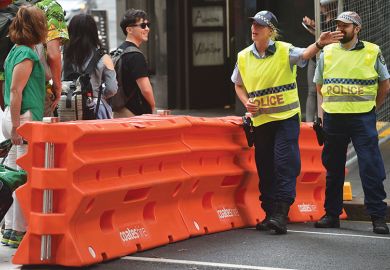 Police directing pedestrians Police directing pedestrians