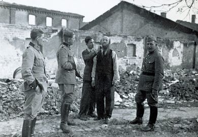 Polish civilian shaving Jewish man