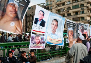 Posters of people killed in anti-government protests, Tahrir Square, Cairo