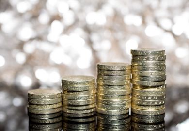 Stacked pound coins Stacked pound coins