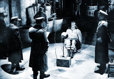 Interrogation of a prisoner of war, illustrating the sometimes intimidating nature of the viva voce exam in the UK.