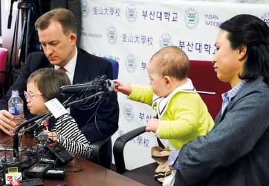 Robert Kelly with his wife Jung-a Kim and children Marion and James, who interrupted his live TV interview on South Korean politics