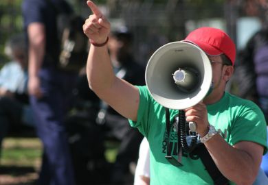 Man holding a megaphone Man holding a megaphone
