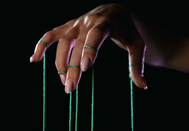 A puppeteer's hand  A puppeteer's hand